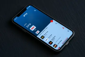 A smartphone displaying a minimalist IPTV app with a pulsing red recording icon on a program listing.